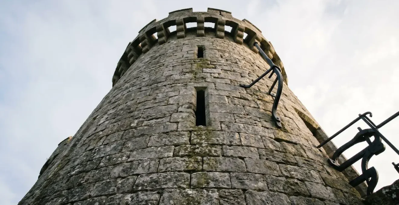 Castle tower photographed with wide-angle lens showing perspective distortion effect